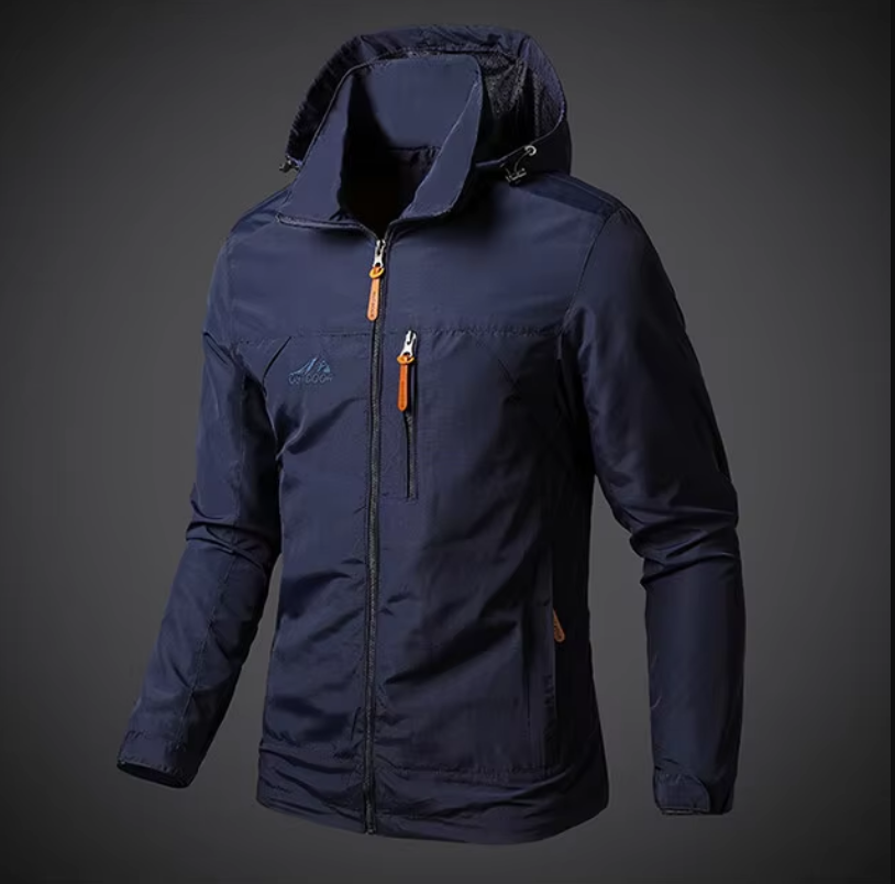 Veste imperméable bleu marine avec capuche, fermeture éclair orange, idéale pour randonnée et activités extérieures. Style moderne et fonctionnel.