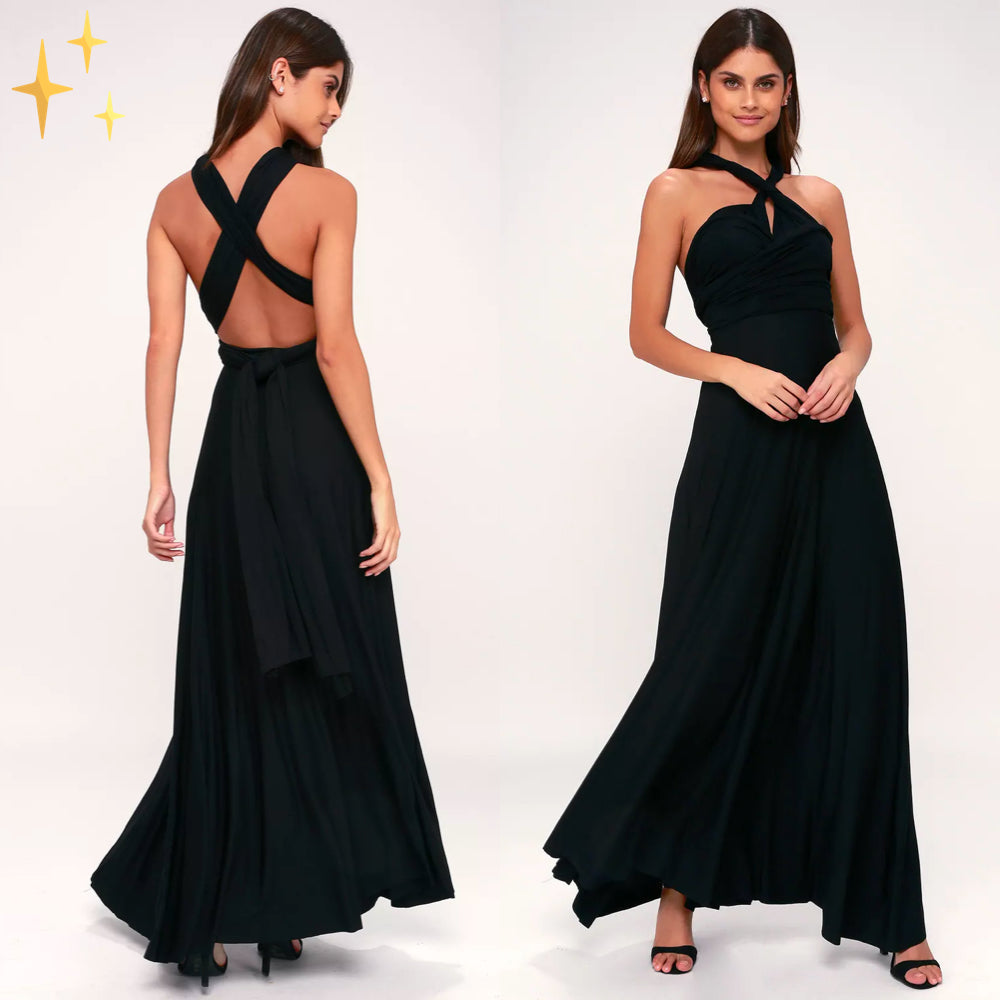 Robe longue noire élégante avec dos croisé, sans manches, portée par une femme souriante. Mode soirée chic, tendance, robe de soirée glamour.