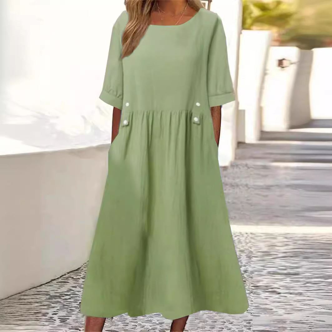 Robe longue verte en lin pour femme, manches courtes, poches latérales, style décontracté, idéale pour l'été, mode féminine élégante.