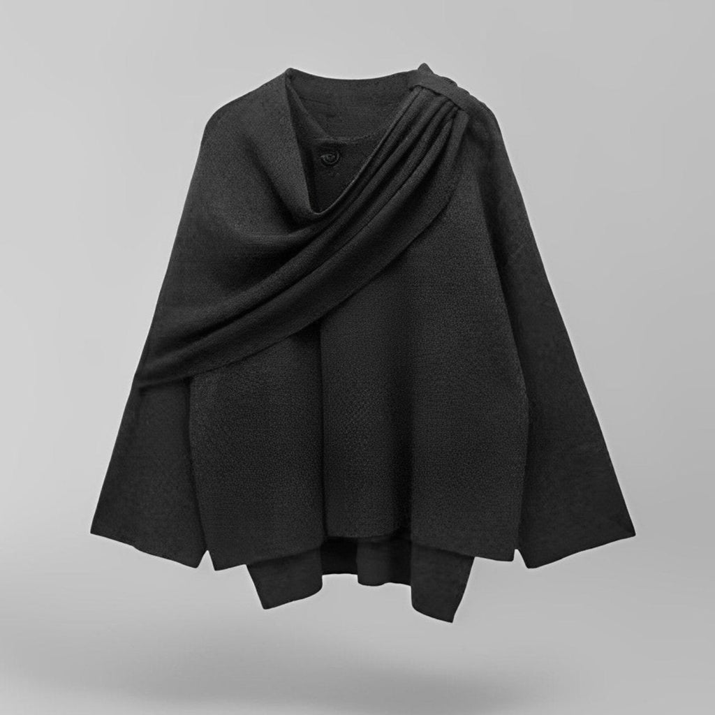 Cape noire élégante en laine, drapée avec boutons, mode automne-hiver, vêtement chaud et stylé, accessoire tendance pour femmes.