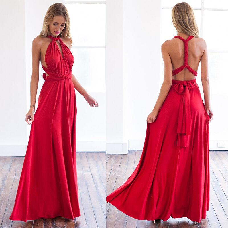 Robe longue rouge élégante avec dos croisé, style soirée, femme debout sur parquet, lumière naturelle, mode féminine chic et glamour.