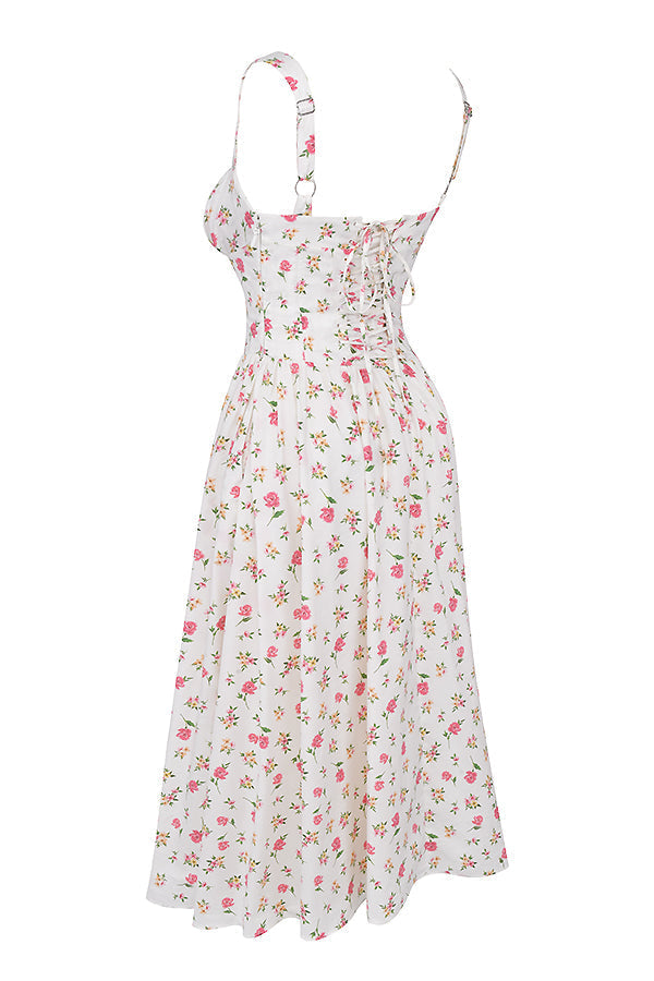 Robe longue blanche à fleurs roses, dos lacé, bretelles fines, style été bohème chic, idéale pour une tenue féminine et élégante.