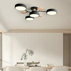 Plafonnier moderne noir et bois à LED dans une salle à manger élégante, éclairage design contemporain, décoration intérieure minimaliste.