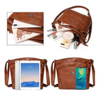 Sac à bandoulière en cuir marron avec compartiments, contenant tablette, smartphone, maquillage. Mode, accessoires, rangement pratique.