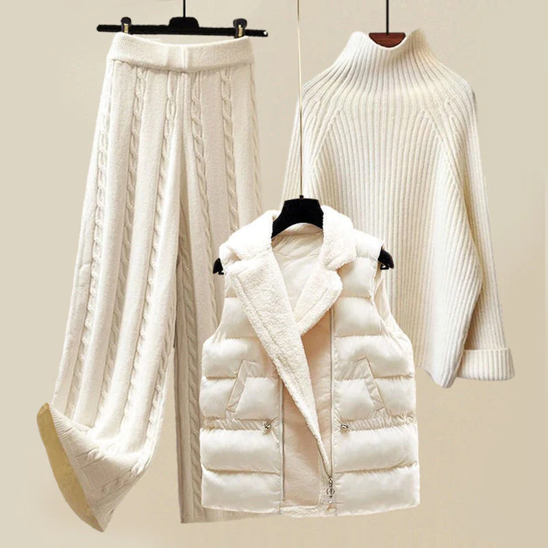 Tenue d'hiver élégante en tricot blanc, comprenant un pull à col roulé, un pantalon à mailles torsadées et une veste sans manches matelassée.