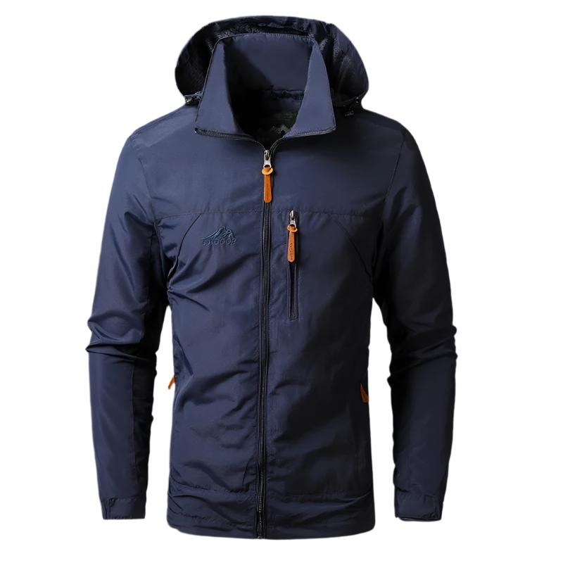 Veste imperméable homme bleu marine avec capuche, fermeture éclair, poches zippées, idéale pour randonnée et activités extérieures.