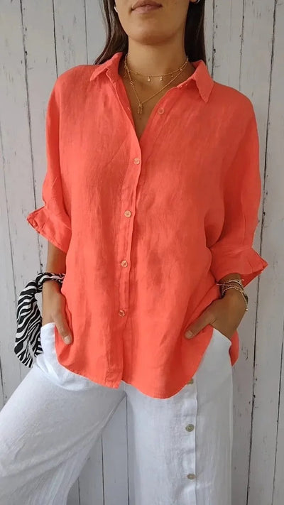 Camisa de mujer 100% lino, manga larga, cuello clásico, corte holgado.