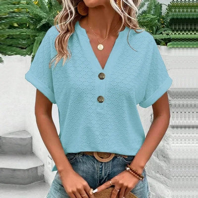 Top transpirable con cuello en V Myla: cómodo y elegante para todos los días.
