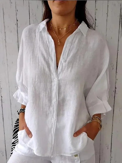 Camisa de mujer 100% lino, manga larga, cuello clásico, corte holgado.
