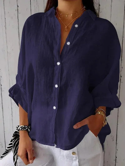 Camisa de mujer 100% lino, manga larga, cuello clásico, corte holgado.