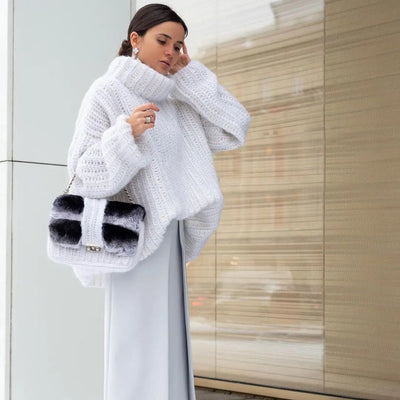 Suéter elegante de gran tamaño para mujer.