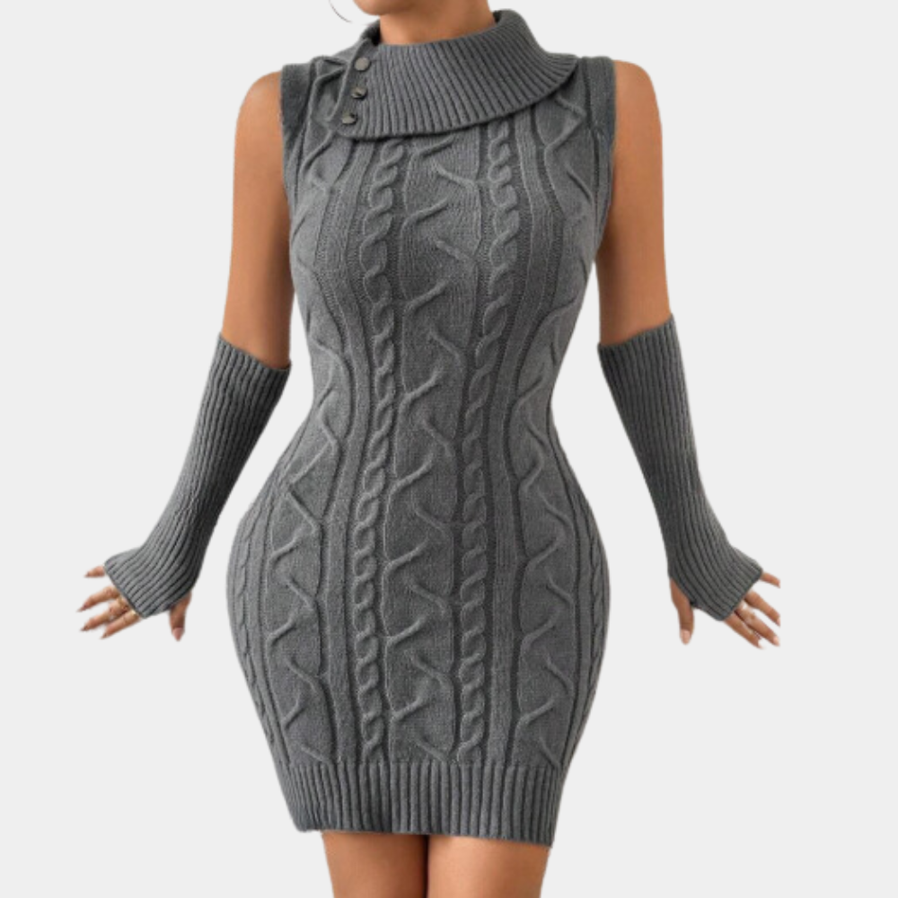 Robe pull gris sans manches avec col roulé et motifs torsadés, accompagnée de mitaines assorties. Mode automne-hiver élégante et tendance.