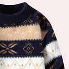 Pull-over en laine bleu marine avec motifs géométriques beige et blanc, style nordique, idéal pour l'hiver, mode tendance et confortable.